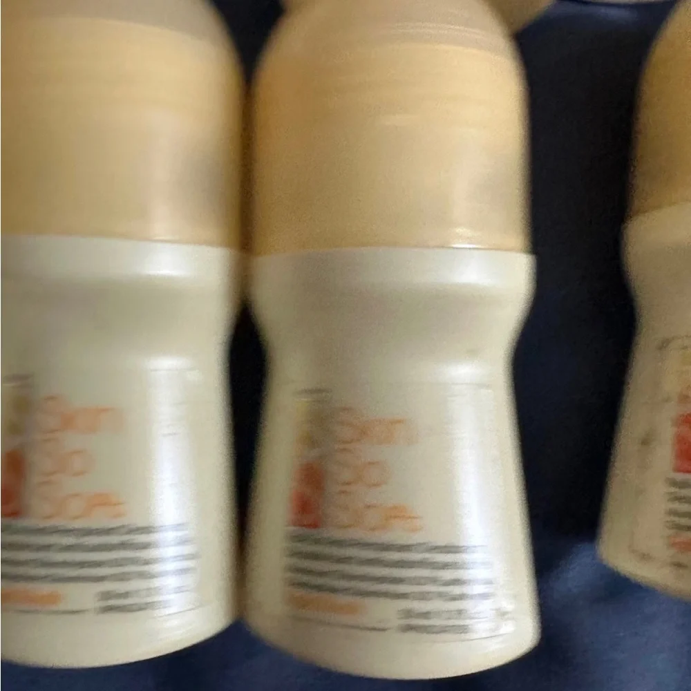 Avon lot of 8 SS Light and Lush is roll on deodorant rare new old stock
